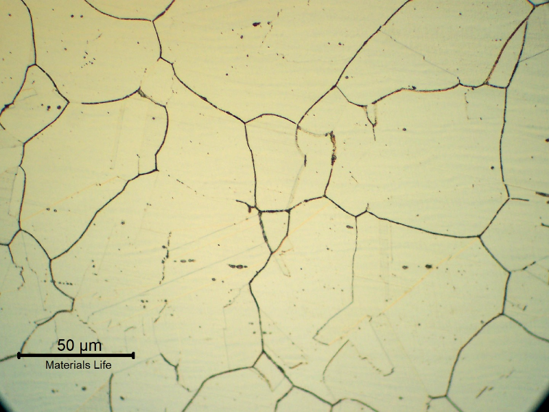 Micrography of the 1.65 mm thickness tube, in the middle of the thickness of the longitudinal section. This part of the tube is located in the colder part of the equipment, position 1. The material presented carbide precipitation at grain boundaries (not yet fully surrounding the grains) and at this point the tube presented no internal corrosion.