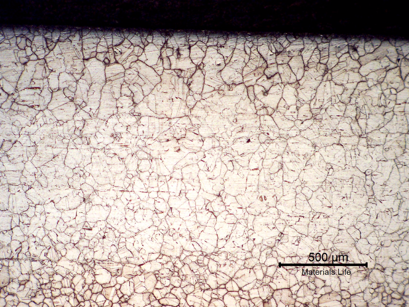 Micrography of a longitudinal section of the tube in position 3, at the internal surface. Although there is a strong precipitation, both intergranular and transgranular, the tube did not corrode at this point.
