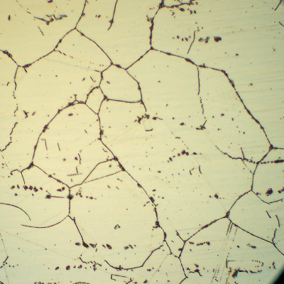 Micrography of the 1.65 mm thickness tube, in the middle of the thickness of the longitudinal section.  This part of the tube is located in position 2, where the temperature was higher and the carbide precipitation increased during service.