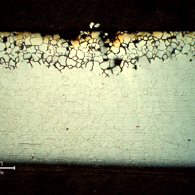 Micrography of a longitudinal section of the tube in position 2, presenting thinning by intergranular corrosion at the internal surface.