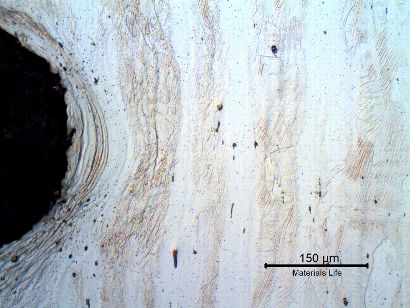 Micrography of the longitudinal section of the bolt, at the thread. The bolt was cold deformed and the thread was cold rolled.