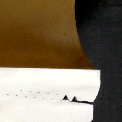 Macrography of the longitudinal section of the tool joint, assembled. The pin is still  attached to the box end of the other drill pipe in the column, showing that the pin fractured in the region of external diameter transition (right side of the figure), where the box was probably touching the pin shoulder. Interesting to note that the inner diameter still presents a sound coating.