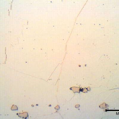 Micrographic detail of the austenitic structure at the surface, where the grain size of the material increased. By optical microscopy the intragranular precipitation due to solution annealing and aging is not revealed.