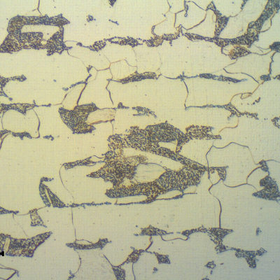 Micrographic detail of the slightly banded perlitic structure, in the center of the thickness.  
ND 3".  7.6 mm thick.