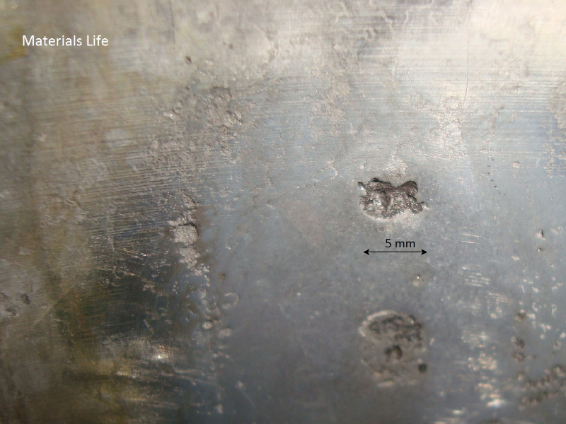 The macroscopic aspect of the surface after preparation. Grinding and polishing.