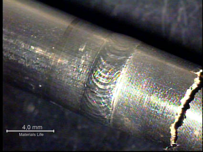 Detail of the welded joint between the 316 tubing (left side) and the nitronic fitting (right side). The through wall cracking is transverse to the line, in the fitting, 10 mm far from the weld, where the fitting was slightly bent to be assembled (cold bent).