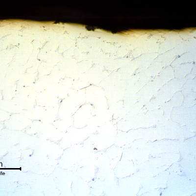 Micrography close to the external surface of a new tube, sound.