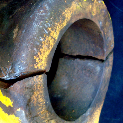 Aspect of the broken padeye.  The outer diameter is about 10" and the thickness of the casting is about 2".