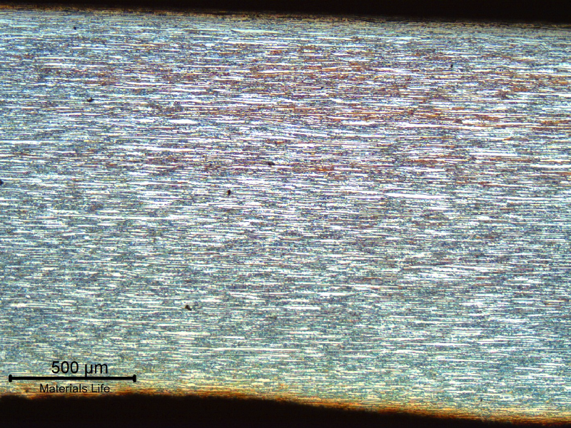 Low magnification micrography of the superduplex stainless steel tubing (base metal), in the longitudinal direction.  Refined ferritic-austenitic structure. The average hardness in the section is 264HV5.