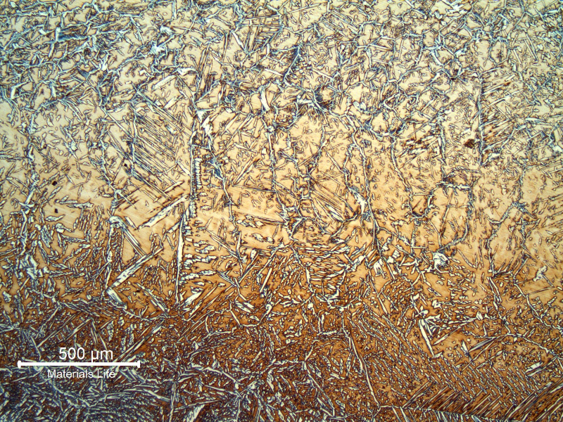 Micrography at the center of the weld metal, showing the interface between the two passes. The average hardness of the weld metal is 260 HV5.