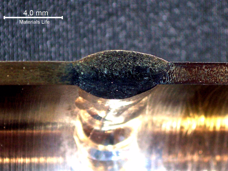 Macrography of the welded joint between a forging connector (right side) and a seamless tubing (left side).  It was welded in two passes by GTAW process.