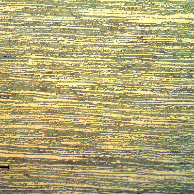 Micrography of the superduplex stainless steel tubing (base metal), in the longitudinal direction.  
Refined ferritic-austenitic structure.