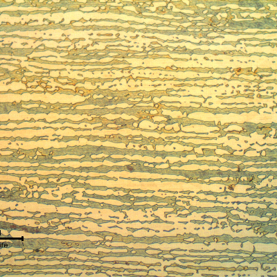 Micrographic detail of the superduplex stainless steel tubing (base metal), in the longitudinal direction.  
Refined ferritic-austenitic structure.
