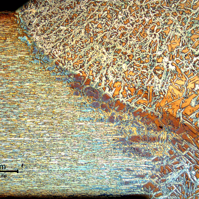 Micrography of the tubing fusion line. The welding was conducted in two passes. The average hardness at the heat affected zone of the tubing is 257 HV5.