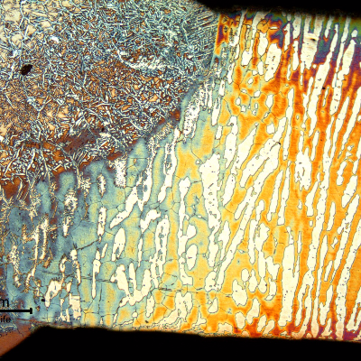 Micrography of the forging fusion line. The welding was conducted in two passes. The average hardness of the heat affected zone is 273 HV5.