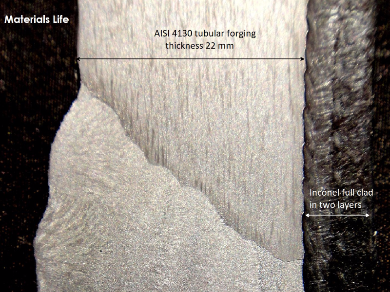 Macrography of the tubular forging, butt welded using a LAS filler metal, and overlaid using Inconel 625 filler metal. The micrographic characterization was conducted for the HAZ of the overlay and for the HAZ of the butt weld, at the root position (with several welding cycles) and at the face.