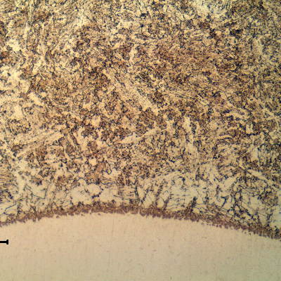 Micrographic detail of the bainitic heat affected zone (HAZ) of 4130 forging at the Inconel overlay.
