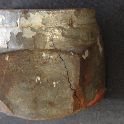 Aspect of the external side of the connector, with a longitudinally crack of a brittle aspect. 
It is a 5/8" connector (15.8 mm).