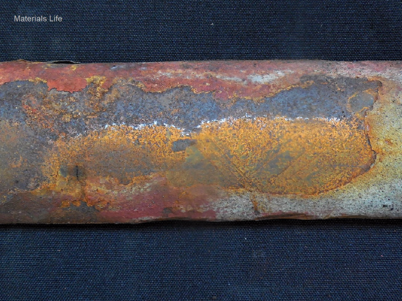 The water wall tube, external diameter 60.3mm and thickness 3.9 mm, shows circunferential cracks in the middle of the section.  Several other tubes have failed after 10 years in service.
