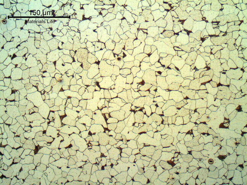 Micrography of a longitudinal section of the tube, 200 mm far from the cracked region, in the center of the thickness (3.9 mm) showing a granular ferritic-perlitic structure.