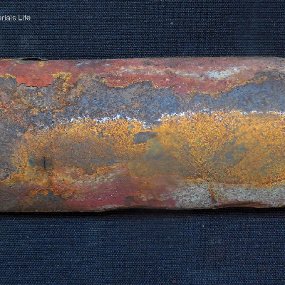 The water wall tube, external diameter 60.3mm and thickness 3.9 mm, shows circunferential cracks in the middle of the section.  Several other tubes have failed after 10 years in service.