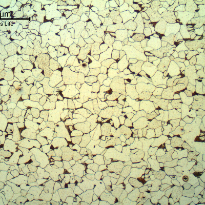 Micrography of a longitudinal section of the tube, 200 mm far from the cracked region, in the center of the thickness (3.9 mm) showing a granular ferritic-perlitic structure.