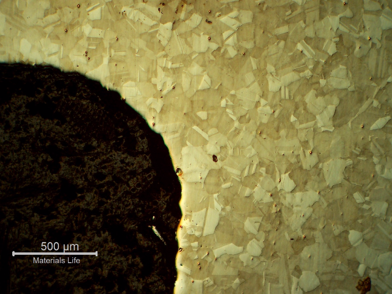 Low magnification micrography of the bolt in a longitudinal section, at the bolt head, showing no evidences of forming operations, indicating it was machined from a heat treated bar. 
Austenitic microstructure, granular, equiaxial, precipitation hardened (shadow in the grains).