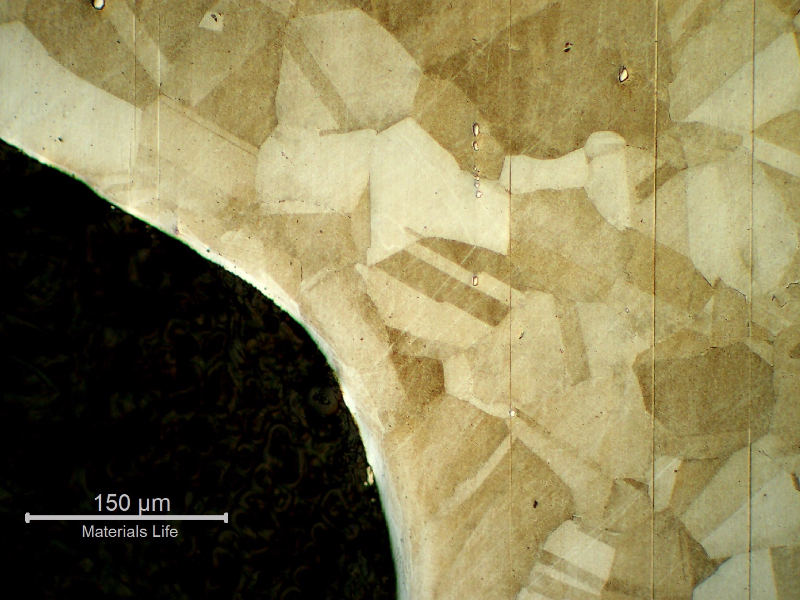 Micrography of the bolt in a longitudinal section, at the bolt thread, showing no evidences of forming operations, indicating it was machined from a heat treated bar.
Austenitic microstructure, granular, equiaxial, precipitation hardened (shadow in the grains).