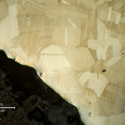 Micrography of the bolt in a longitudinal section, at the bolt head, showing no evidences of forming operations, indicating it was machined from a heat treated bar. 
Austenitic microstructure, granular, equiaxial, precipitation hardened (shadow in the grains).