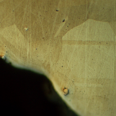 Micrographic detail of the bolt in a longitudinal section, at the bolt head, showing no evidences of forming operations, indicating it was machined from a heat treated bar. 
Austenitic microstructure, granular, equiaxial, precipitation hardened (shadow in the grains).