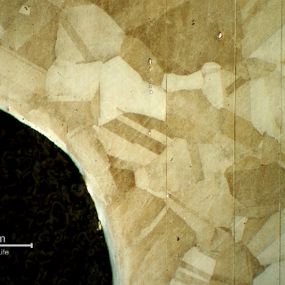 Micrography of the bolt in a longitudinal section, at the bolt thread, showing no evidences of forming operations, indicating it was machined from a heat treated bar. 
Austenitic microstructure, granular, equiaxial, precipitation hardened (shadow in the grains).