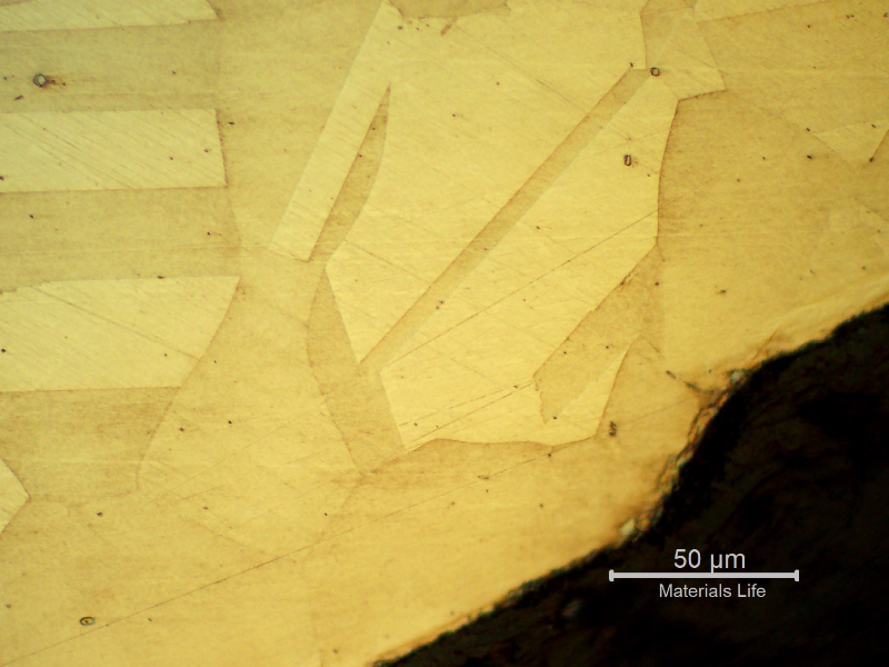 Micrography of the bolt in a longitudinal section, at the bolt thread, showing no evidences of forming operations, indicating that it was machined from a heat treated bar. Austenitic microstructure, granular, equiaxial.
