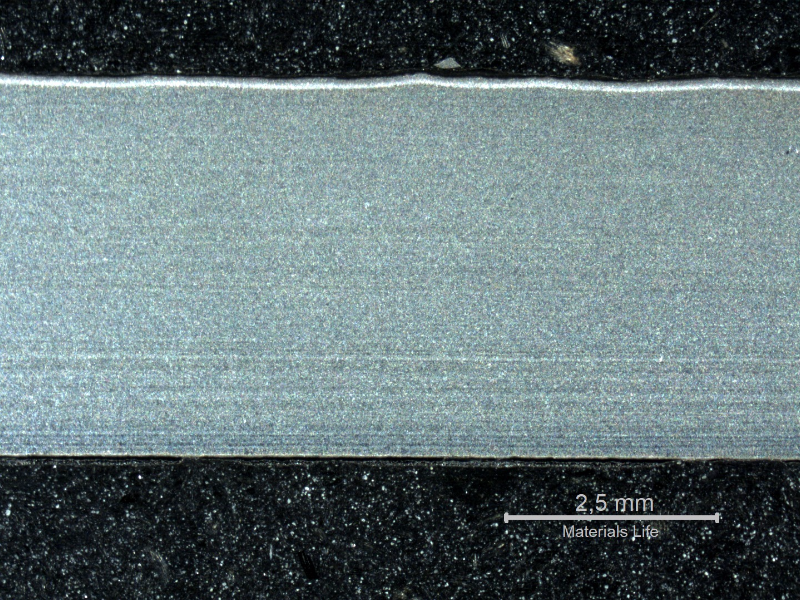 The macrography of a longitudinal section shows that the tube did not present local thinning in any region, but the internal and external scales are evidenced. The external surface (OD) is to the top of the figure and the internal surface (ID) is to the bottom of the figure.