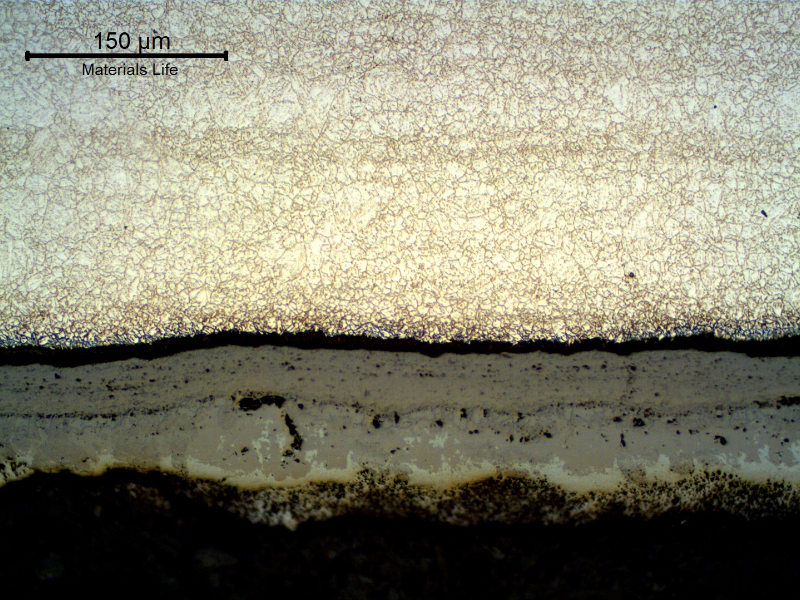 Micrography of the longitudinal section of the tube, close to the internal surface. 
A thick scale is evident, but no microstructural changes compared to the center of the tube.