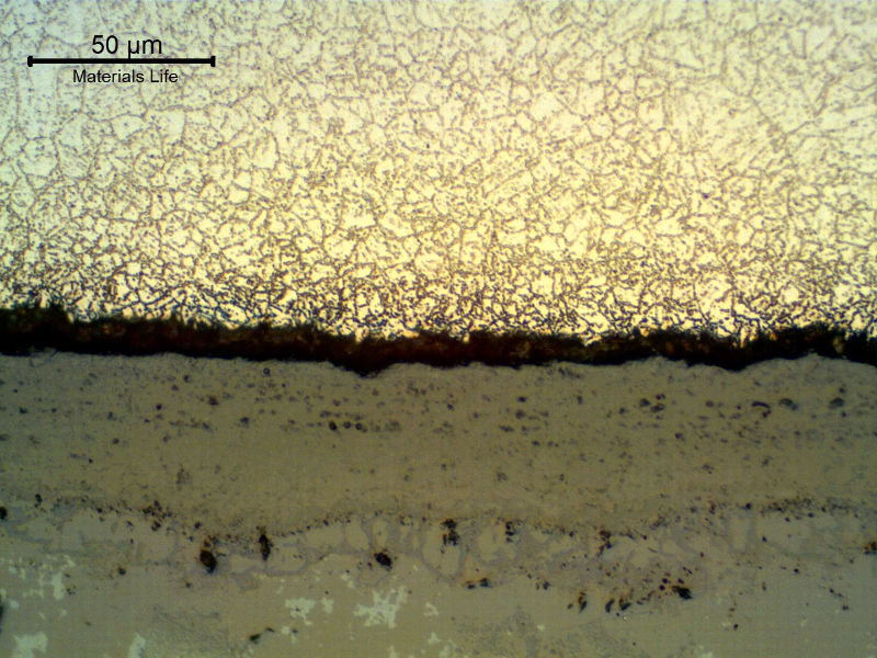 Micrography of the longitudinal section of the tube, close to the internal surface. 
A thick scale is evident, but no microstructural changes compared to the center of the tube.