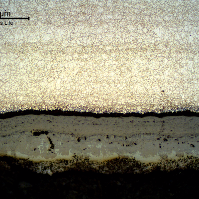 Micrography of the longitudinal section of the tube, close to the internal surface. 
A thick scale is evident, but no microstructural changes compared to the center of the tube.