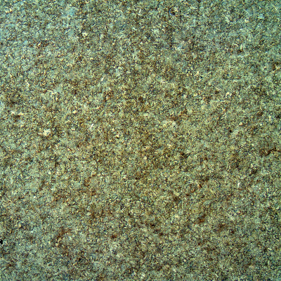 Low magnification micrography of the pin in the center of the 25 mm thickness. Bainitic structure of the material that was quenched and tempered after spray and fuse application. Transverse section presenting a uniform structure.