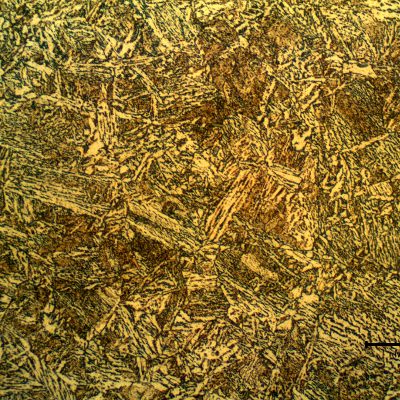 Micrographic detail of the bainitic structure in the center of the thickness of the tubular forging pin. Transverse section. The fuse is conducted in high temperature and the pin was heat treated after the thermal spray deposition and fuse.