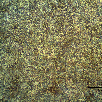 Micrography of the bainitic structure in the center of the thickness of the tubular forging pin. Transverse section. The fuse is conducted in high temperature and the pin was heat treated after the thermal spray deposition and fuse.