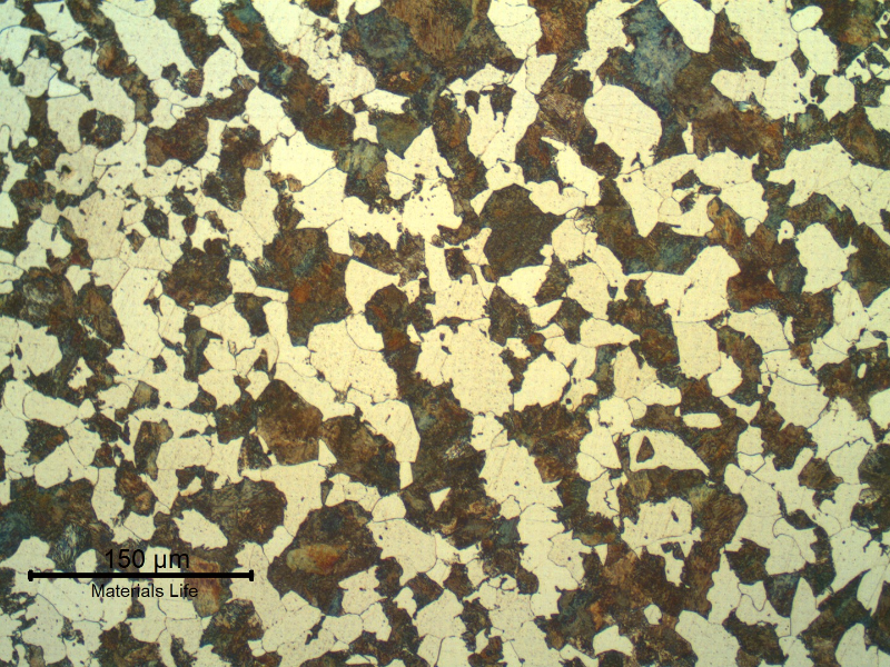 Micrography of the ferritic-pearlitic structure in the center of the thickness of the tubular forging pin. Transverse section. The fuse is conducted in high temperature and the pin was not heat treated after the thermal spray deposition and fuse.