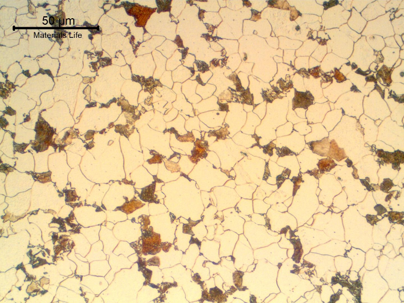 Micrography of a transverse section of the pipe, external diameter 26.7 mm, in the center of the 7.85mm thickness.  Refined structure but not uniform.  Ferrite and pearlite.