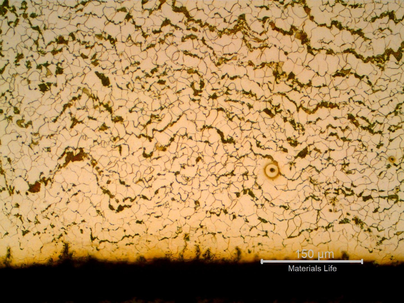 Micrography of a transverse section of the pipe, close to the internal surface (ID). 
Refined structure, but not uniform. Ferrite and pearlite.  The pearlite colonies appear in a network.
