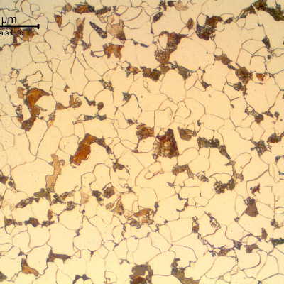 Micrography of a transverse section of the pipe, close to the internal surface (ID). 
Refined structure. Ferrite and pearlite.  The structure is not uniform.  There is a large variation in the ferritic grain size and the pearlite colonies appear forming a network.
