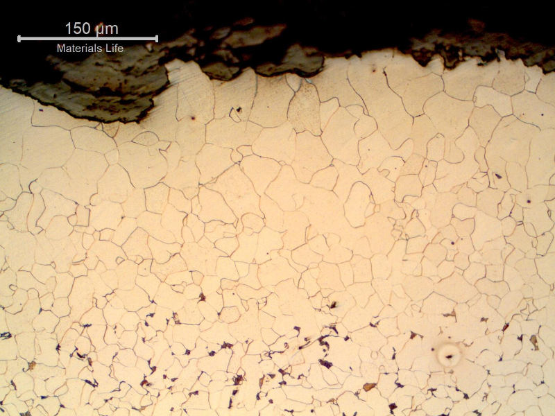 Micrography of a transverse section of the pipe, close to the external surface (OD). The pipe presented a 0.2 mm decarburized layer, fully ferritic.
