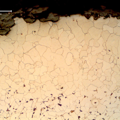 Micrography of a transverse section of the pipe, close to the external surface (OD). The pipe presented a 0.2 mm decarburized layer, fully ferritic.