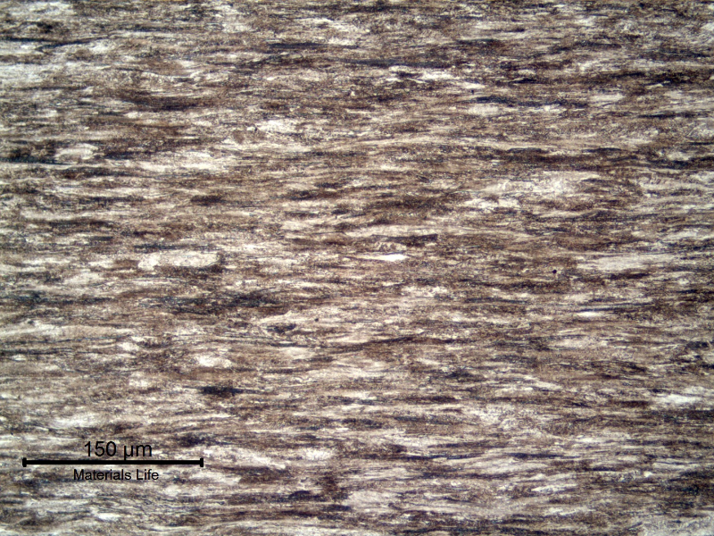 Micrography of a longitudinal section of a 4 mm diameter wire base metal, presenting a strain hardened and aligned pearlitic structure.
