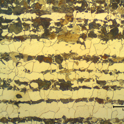 Micrographic detail of a transverse section of the tubing, in the center of the thickness.  
Ferritic-pearlitic structure. 
Pearlite colonies in bands.