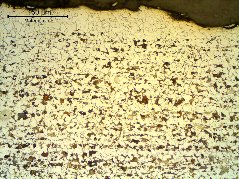 Micrography of a transverse section of the tubing in the center of the thickness. Ferritic-pearlitic structure. The structure is fully ferritic in a small extension at the surface, due to a decarburization effect during manufacturing.