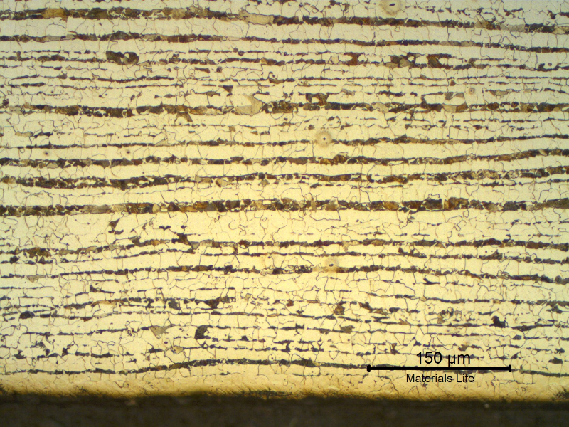 Micrographic detail of a transverse section of the tubing, close to the internal surface. Ferritic-pearlitic structure, refined.