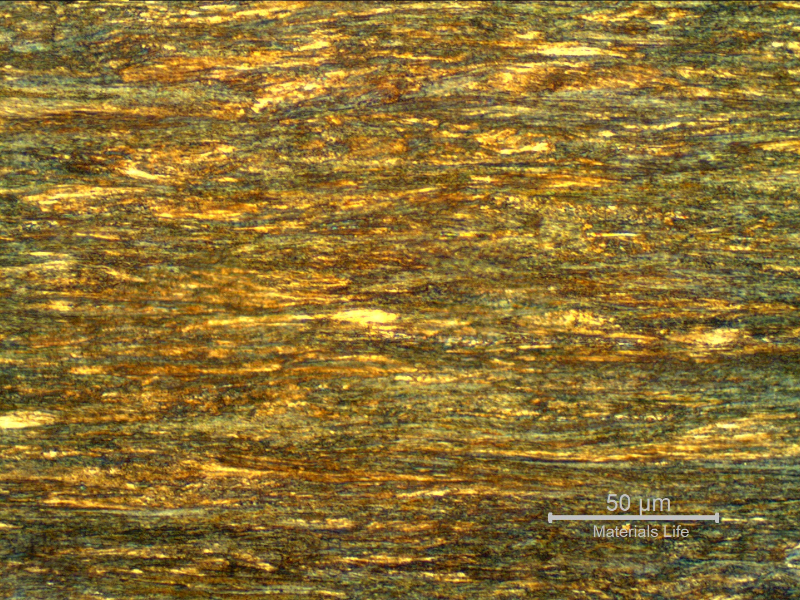 Micrographic detail of a longitudinal section of the internal strand wire, 2.6 mm diameter, in the center of the thickness, showing a strain hardened pearlitic structure.